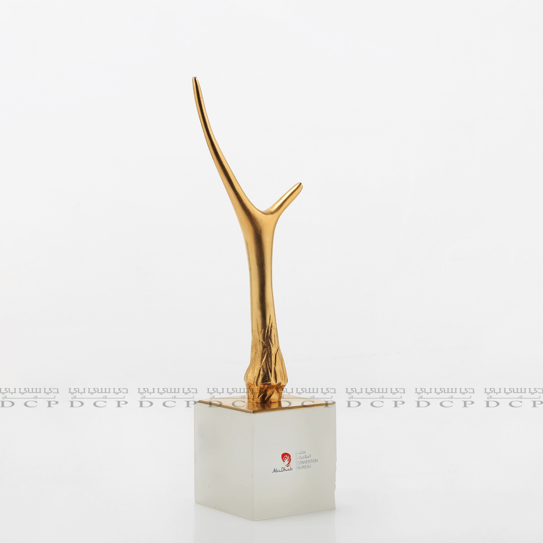 Full view of an elegant brass trophy with gold plating, featuring a sleek design and sturdy base, perfect for recognition events