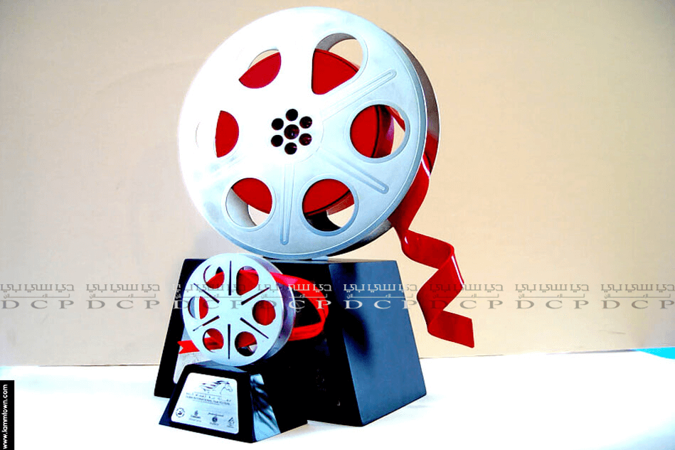Full view of the custom cinema film reel award with branding, designed for recognizing excellence in the film industry