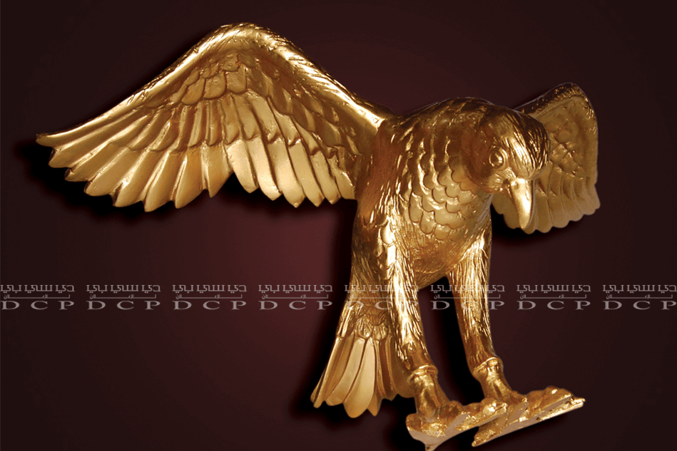 Golden eagle sculpture in mid-flight, wings spread wide with intricate detailing, perfect for luxury decor