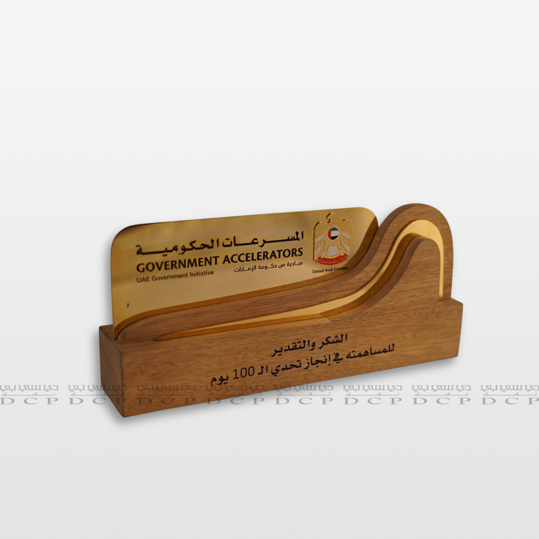Full view of a gold-plated desktop sign with a wooden base, ideal for office or reception use