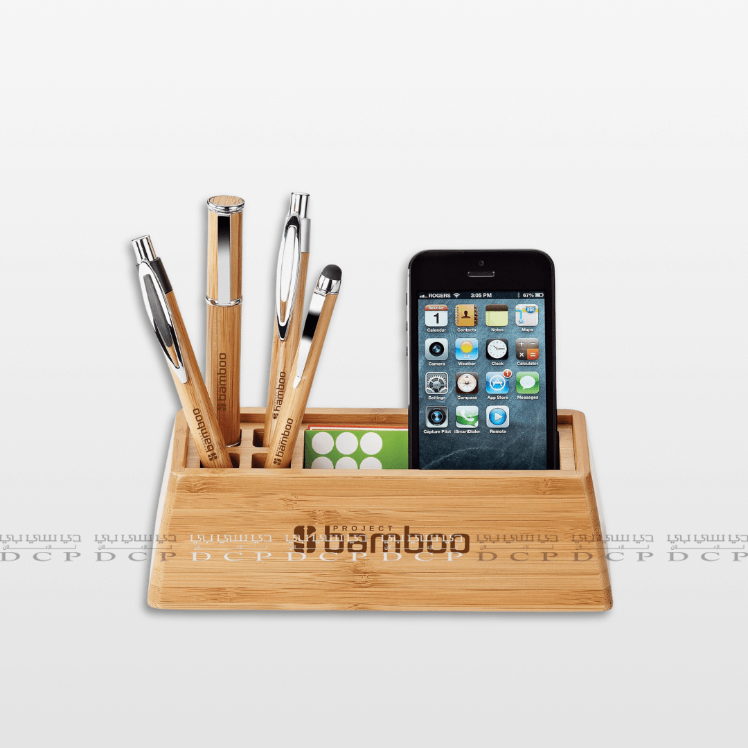 Full view of a wooden desk organizer designed to hold a mobile phone and pens, providing a clean and organized workspace